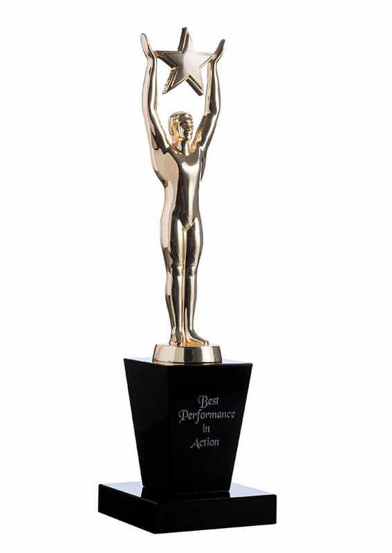 Gold oscar figurine with star on black crystal base