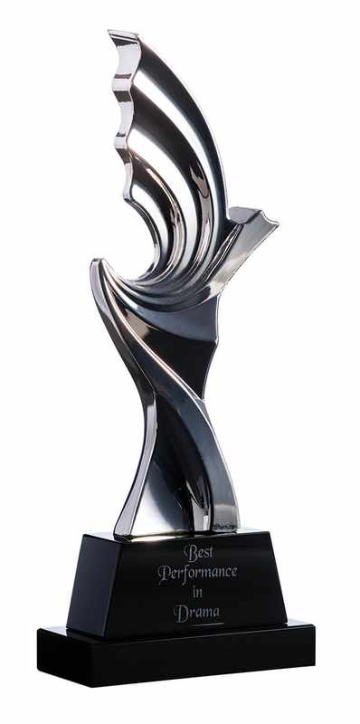 Silver figurine on black crystal base